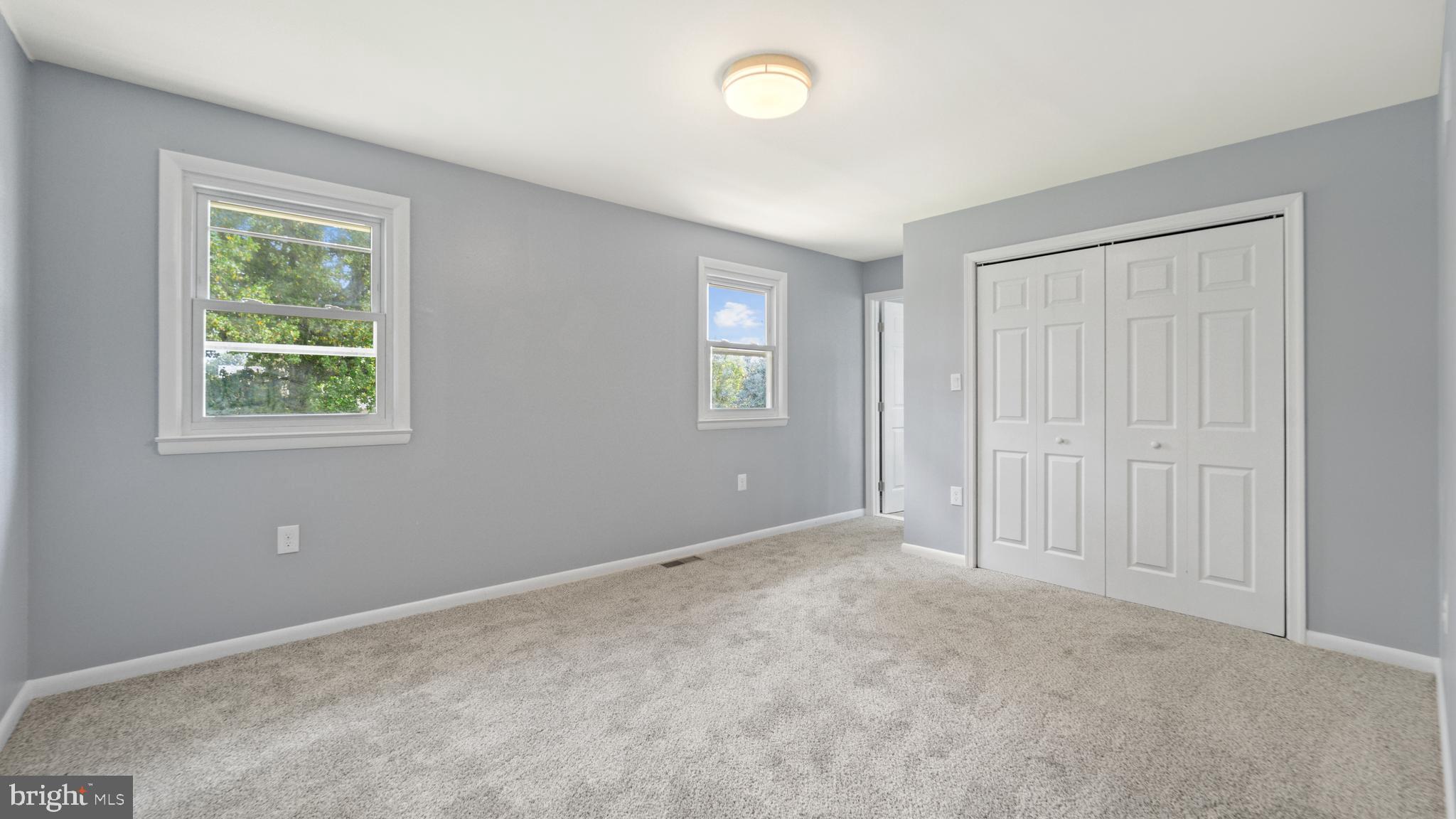 3605 Chapman Road Randallstown, MD 21133 - Photo 36 of 65 an empty room with windows and closet