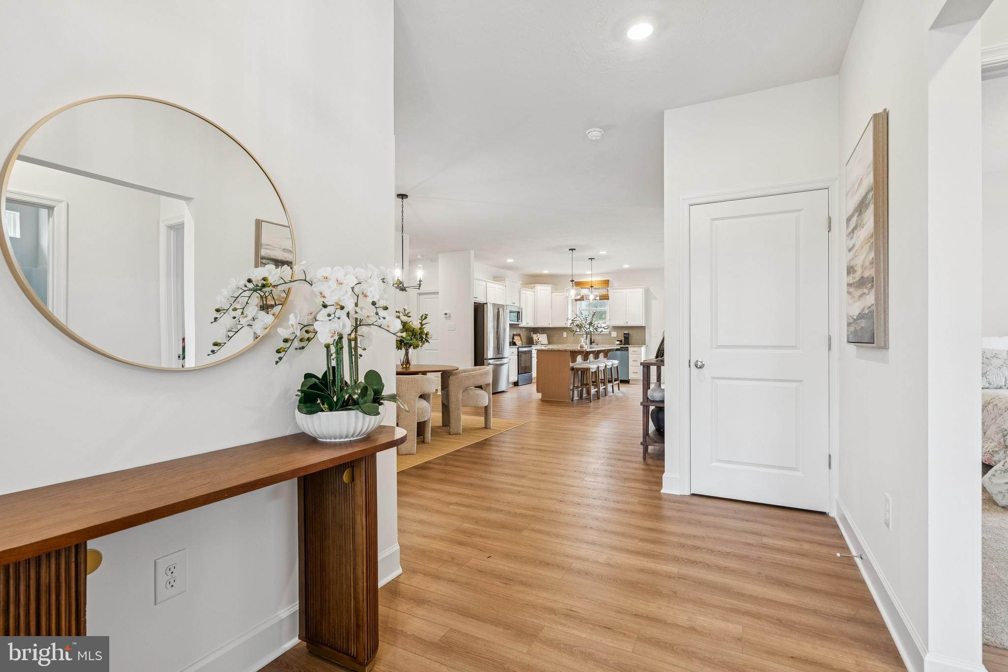 136 Piedmont Way, Unit 102 Hanover, PA 17331 - Photo 4 of 40 a view of a living room and chandelier