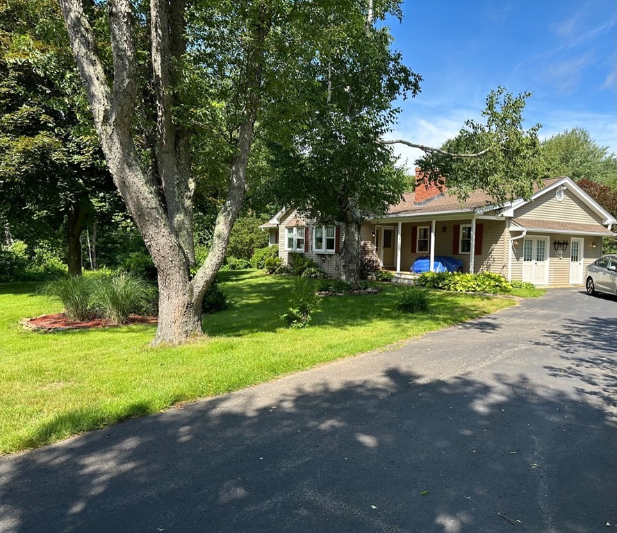 45 St George Road Brimfield, MA 01010 - Photo 1 of 1 a front view of a house with a yard