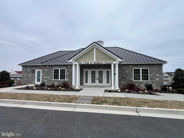 a front view of a house with a patio