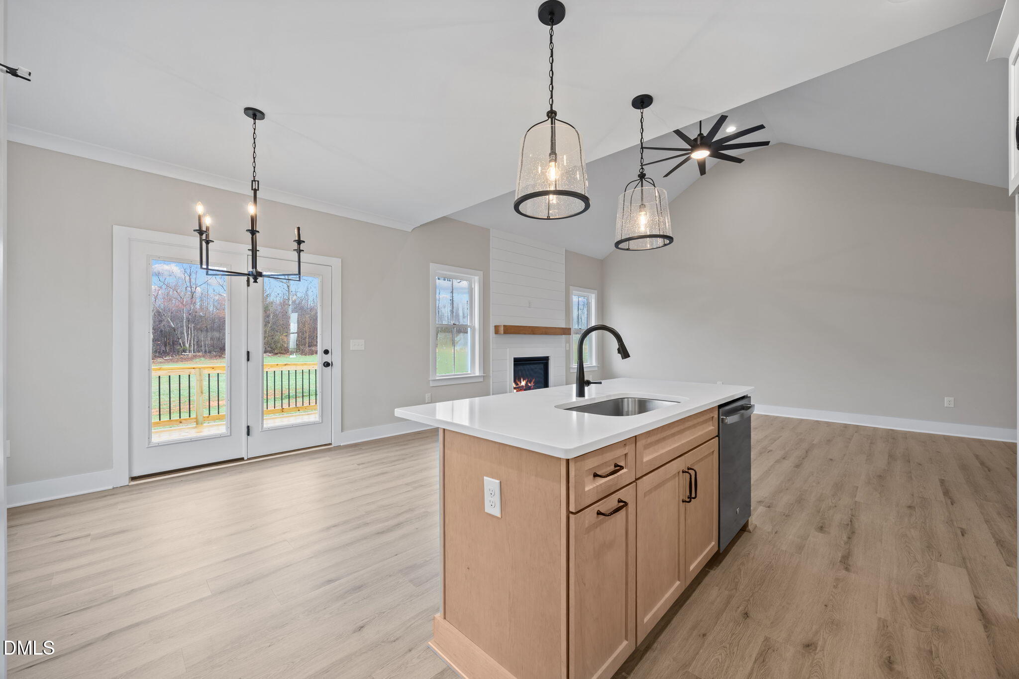 1221 Antioch Church Road Timberlake, NC 27583 - Photo 12 of 45 a kitchen that has a lot of cabinets and wooden floor