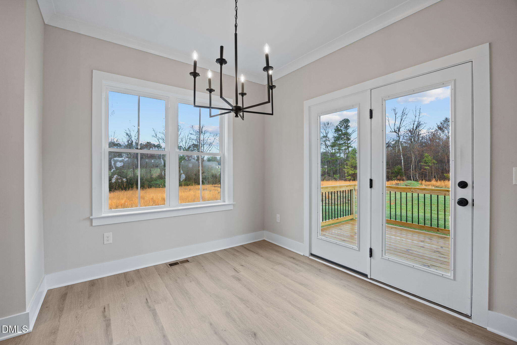 1221 Antioch Church Road Timberlake, NC 27583 - Photo 13 of 45 a view of an empty room with a window