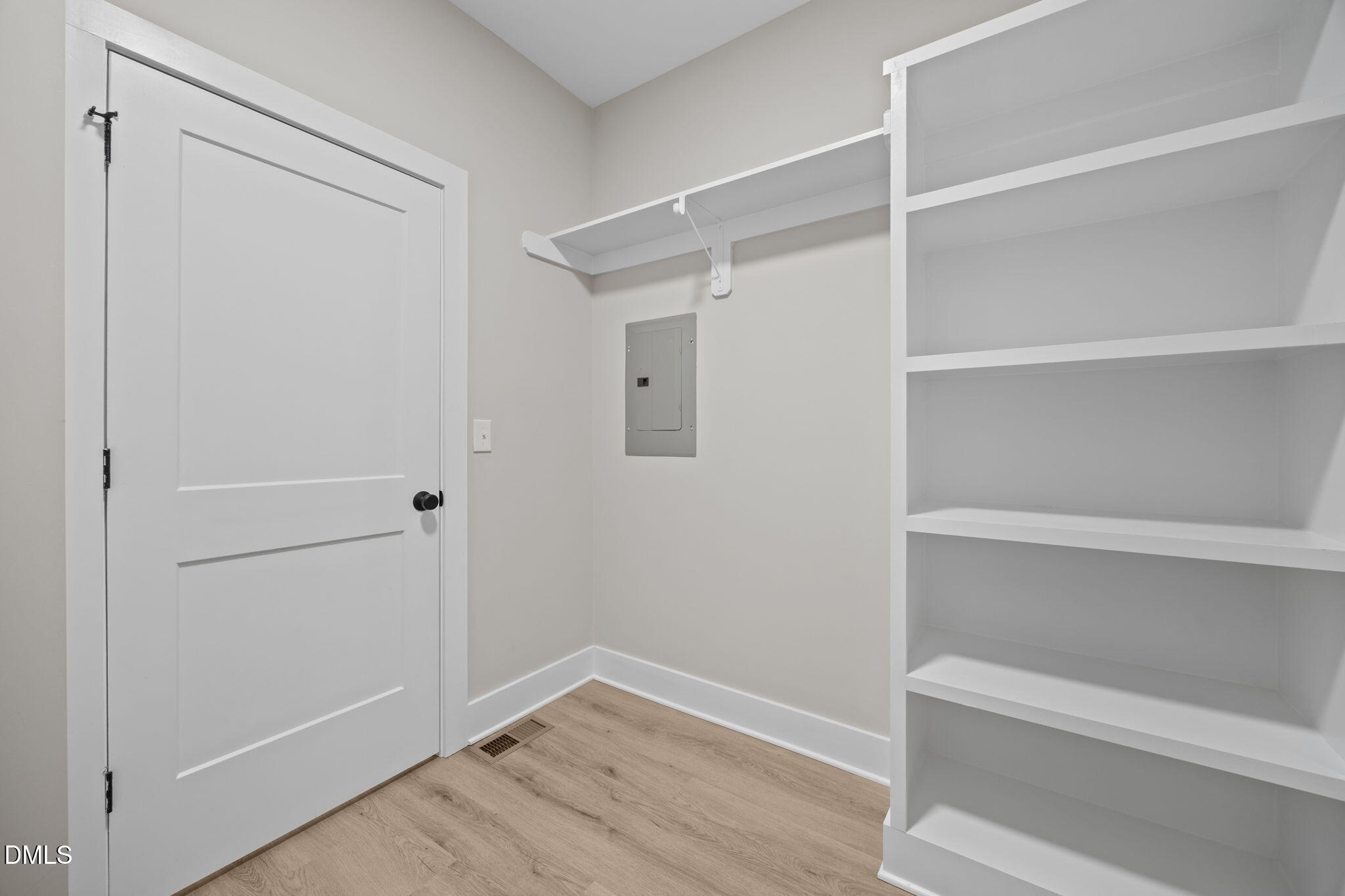 1221 Antioch Church Road Timberlake, NC 27583 - Photo 19 of 45 a view of an empty walk in closet