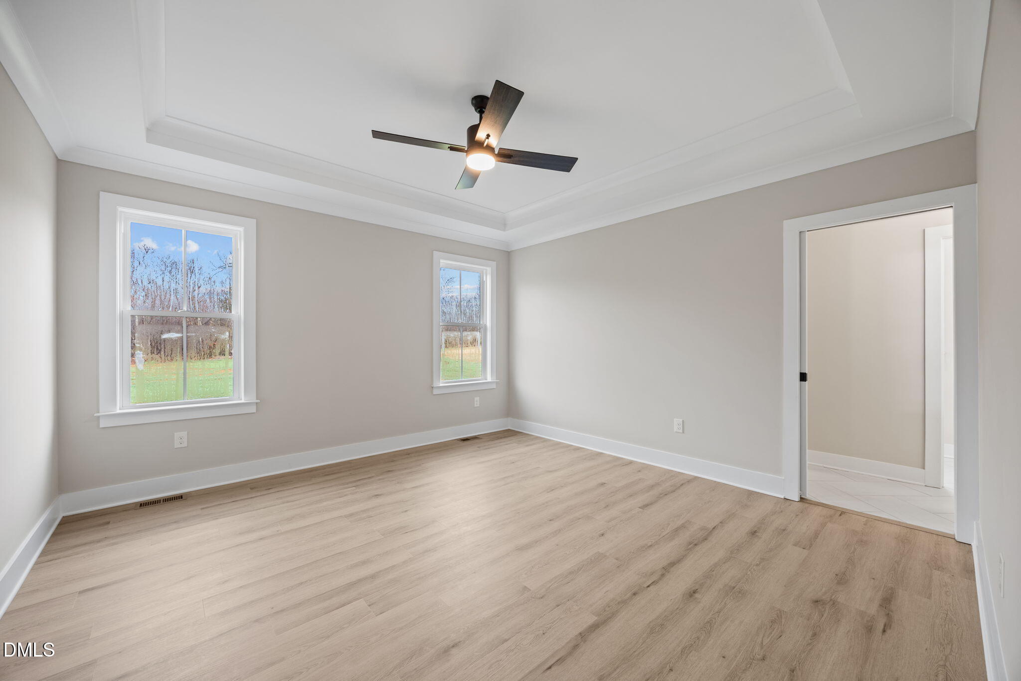 1221 Antioch Church Road Timberlake, NC 27583 - Photo 23 of 45 wooden floor in an empty room with a window