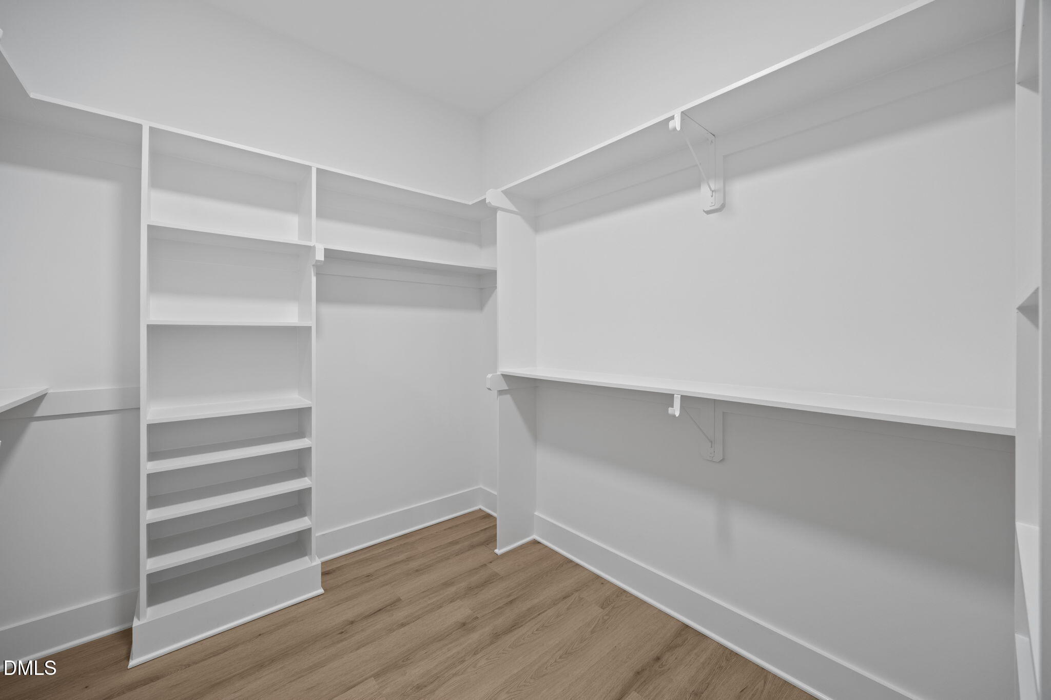 1221 Antioch Church Road Timberlake, NC 27583 - Photo 24 of 45 a view of walk in closet with empty racks