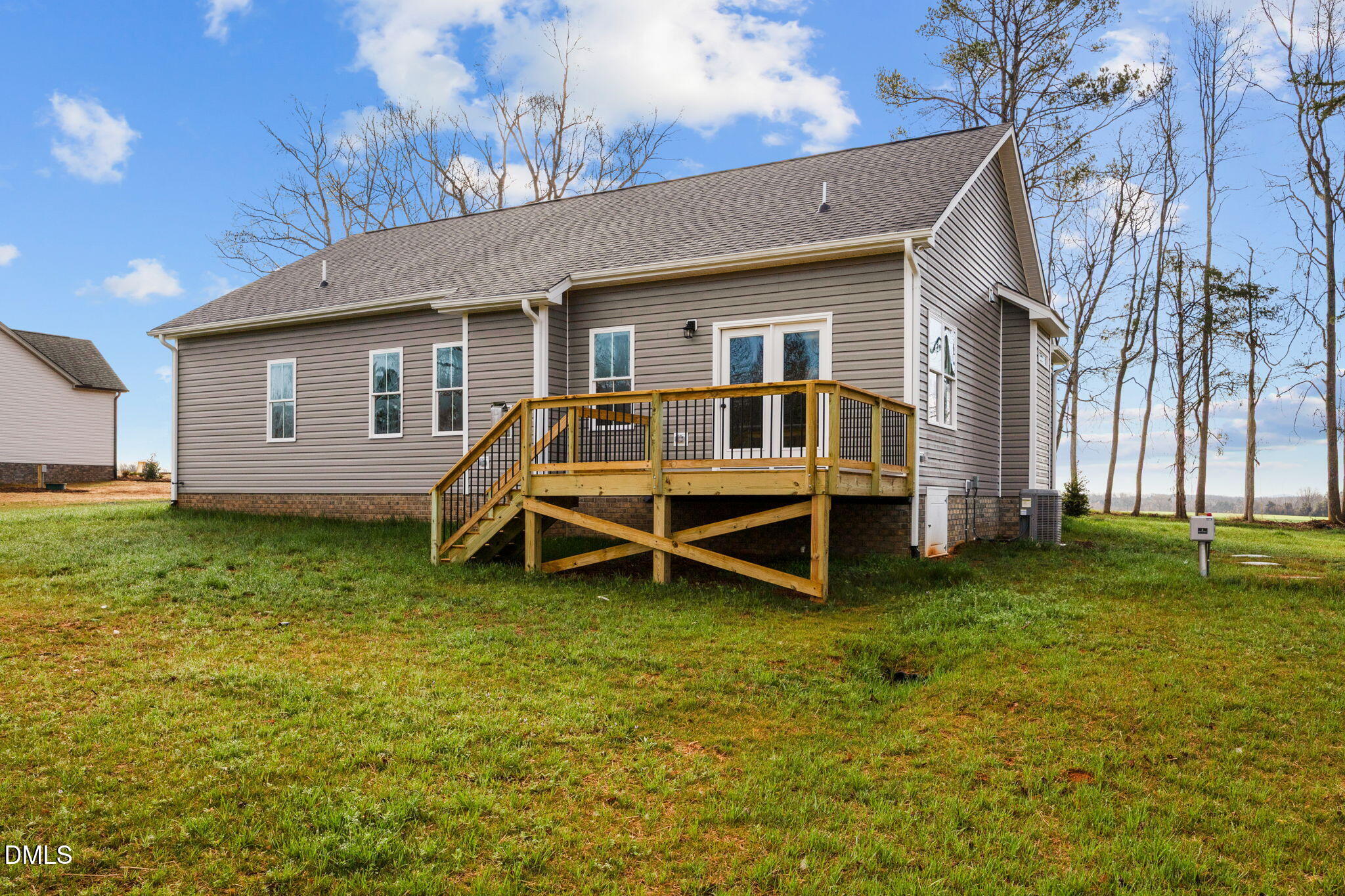 1221 Antioch Church Road Timberlake, NC 27583 - Photo 36 of 45 a view of a house with a yard and sitting area