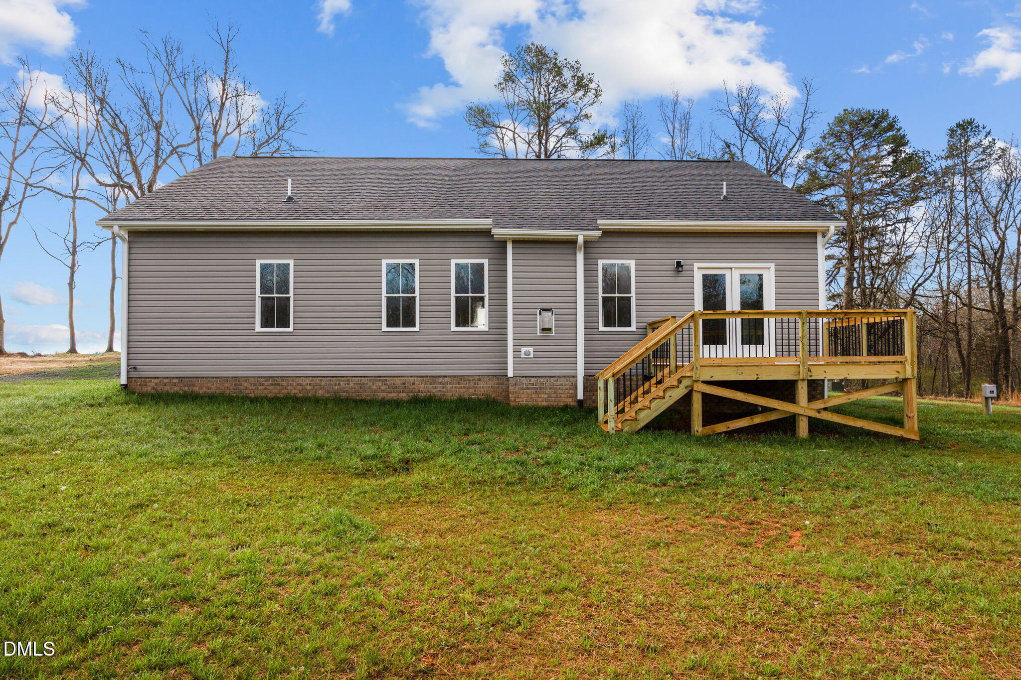 1221 Antioch Church Road Timberlake, NC 27583 - Photo 37 of 45 a view of a house with a backyard