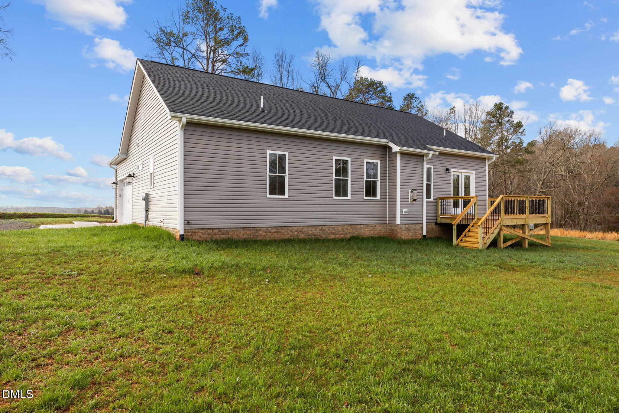 1221 Antioch Church Road Timberlake, NC 27583 - Photo 38 of 45 a view of a yard with a house