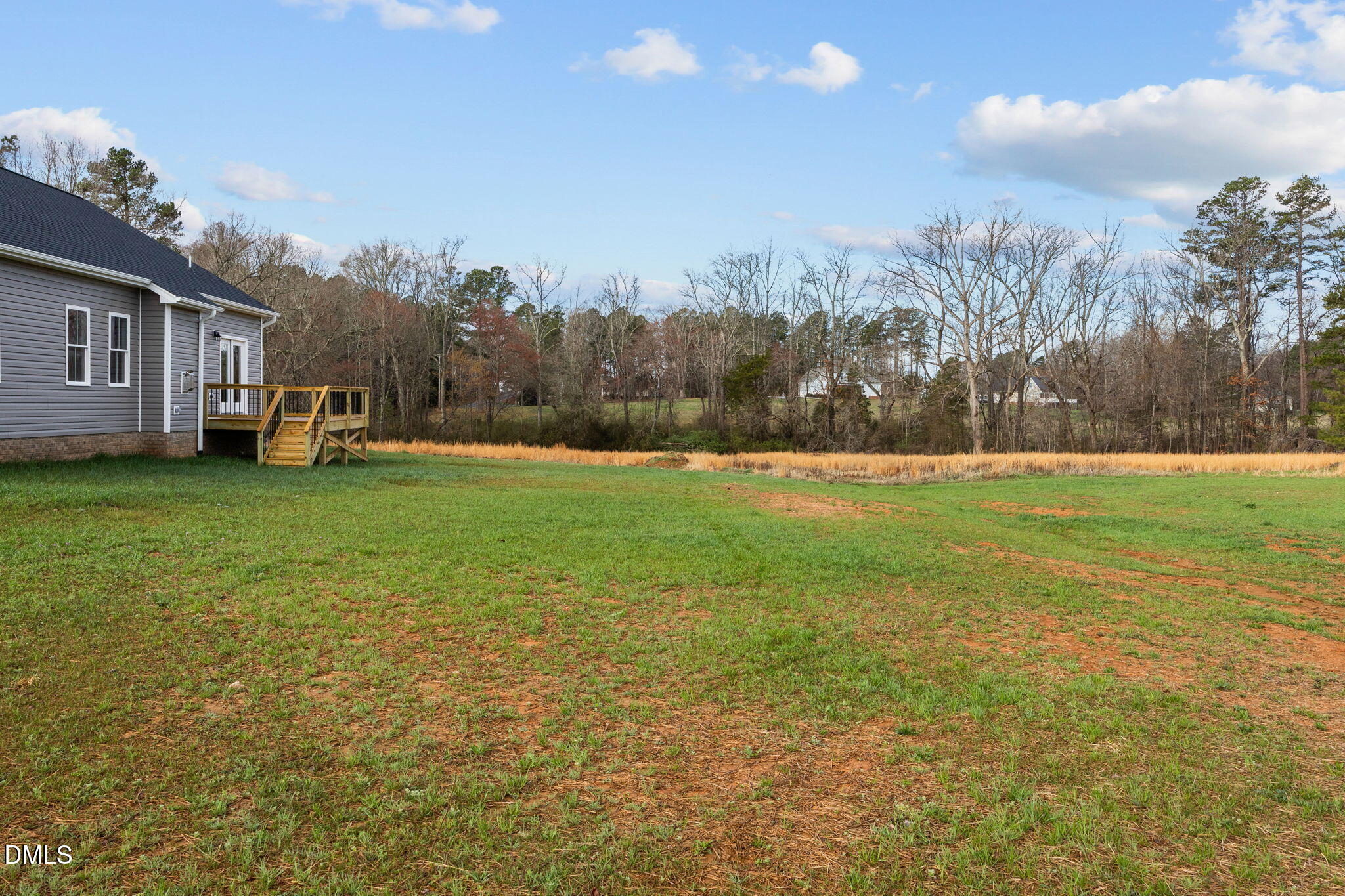 1221 Antioch Church Road Timberlake, NC 27583 - Photo 40 of 45 a view of a field of grass and trees