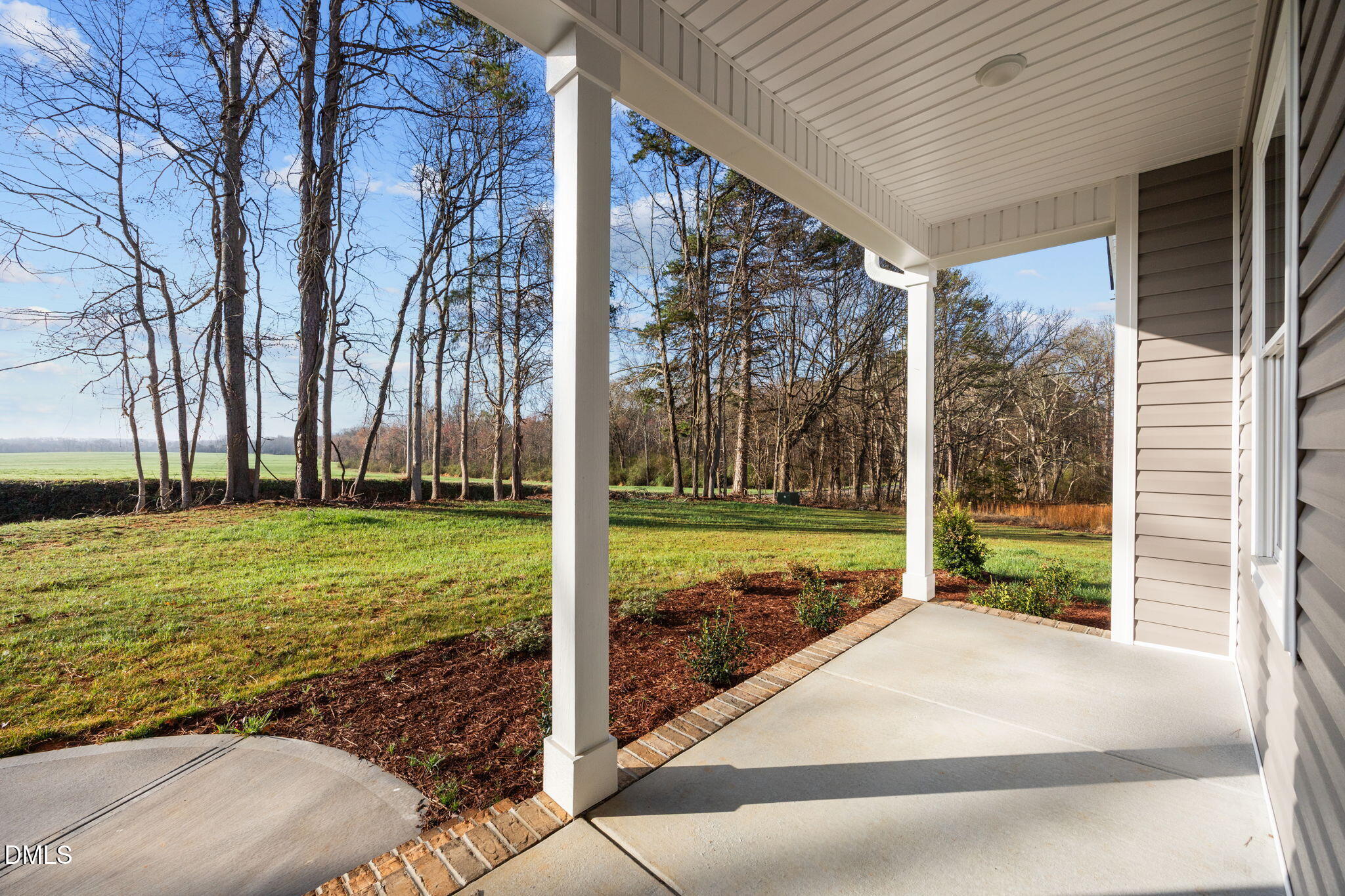 1221 Antioch Church Road Timberlake, NC 27583 - Photo 4 of 45 a view of a porch with a yard