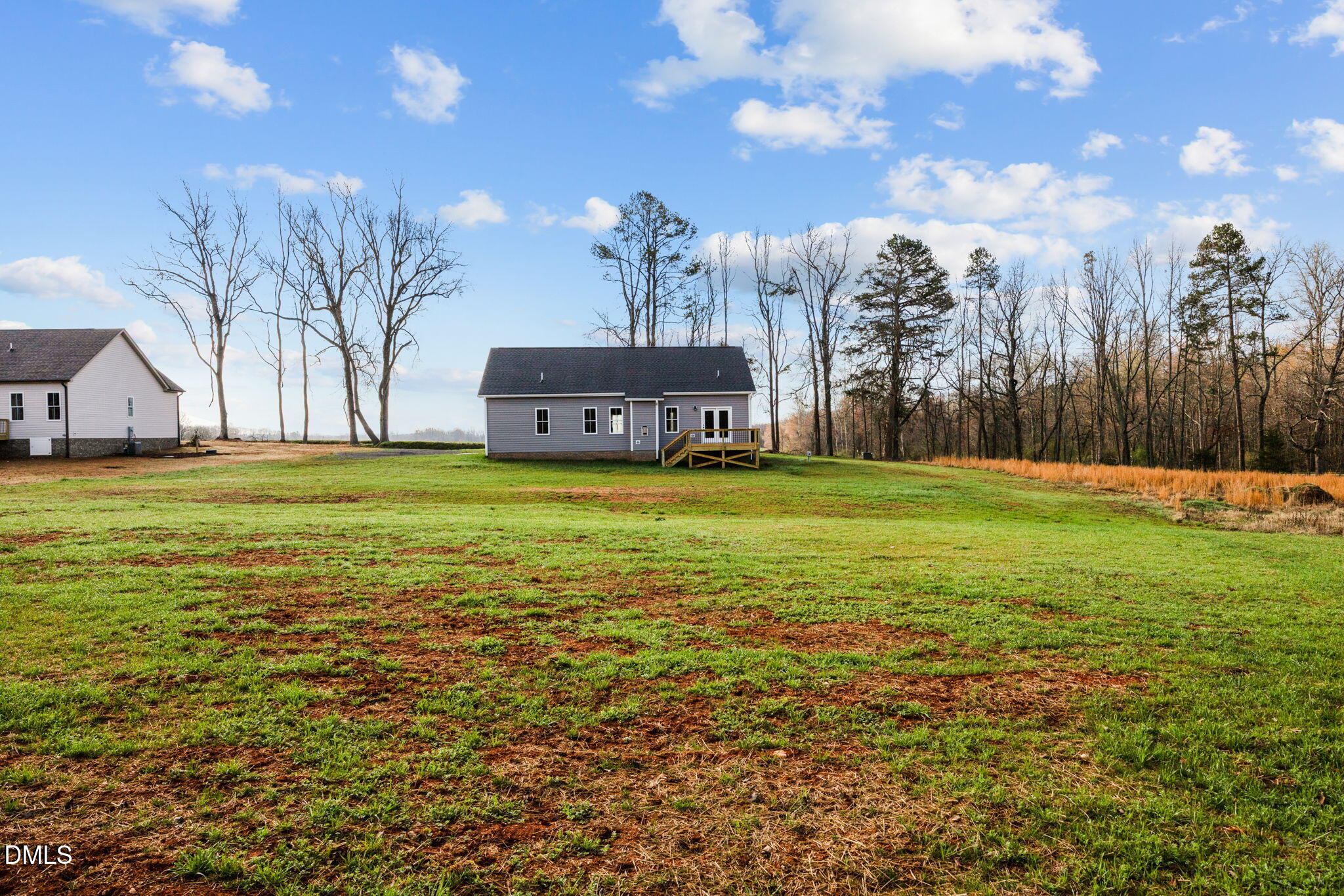 1221 Antioch Church Road Timberlake, NC 27583 - Photo 41 of 45 a view of a building with a big yard