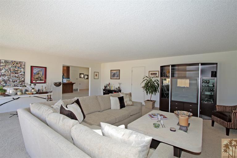 71520 Gardess Road Rancho Mirage, CA 92270 - Photo 12 of 25 a living room with furniture and a large window