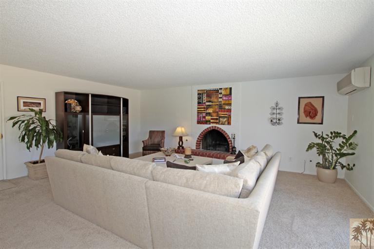 71520 Gardess Road Rancho Mirage, CA 92270 - Photo 13 of 25 a living room with furniture and a potted plant