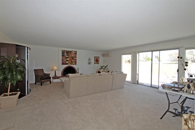 71520 Gardess Road Rancho Mirage, CA 92270 - Photo 14 of 25 a living room with furniture and a large window
