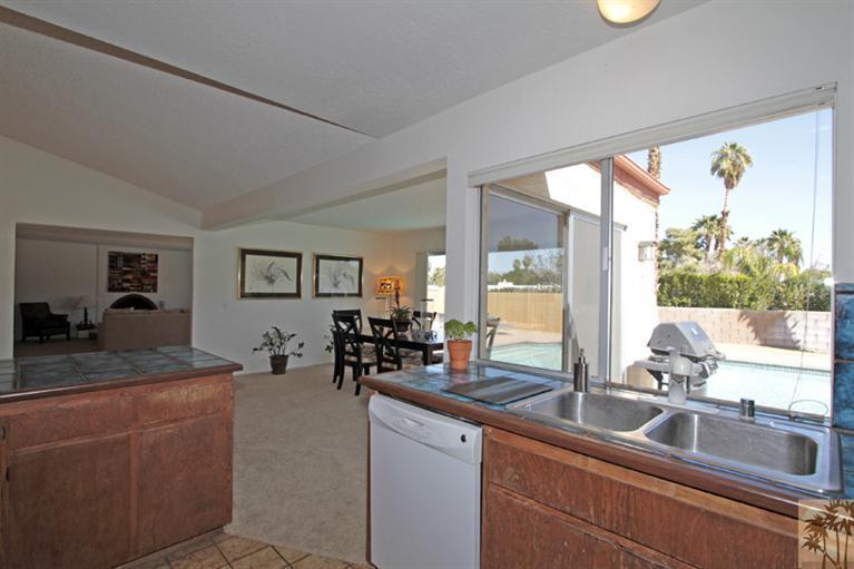 71520 Gardess Road Rancho Mirage, CA 92270 - Photo 15 of 25 a view of a kitchen from a living room
