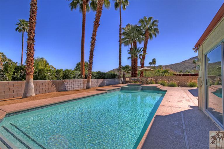 71520 Gardess Road Rancho Mirage, CA 92270 - Photo 21 of 25 a view of a garden with swimming pool