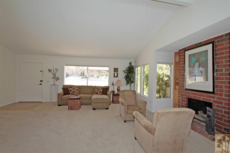 71520 Gardess Road Rancho Mirage, CA 92270 - Photo 6 of 25 a living room with furniture and a flat screen tv