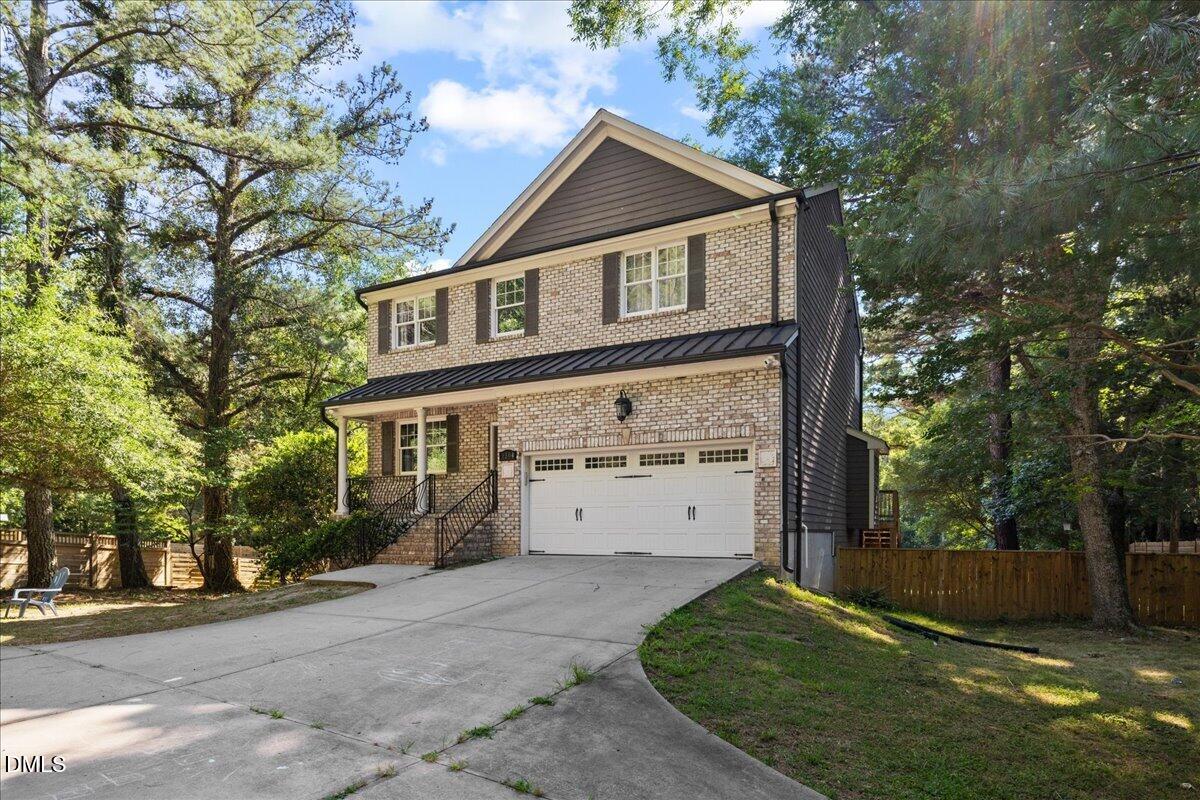 1304 Flying Hawk Road Apex, NC 27523 - Photo 45 of 52 a front view of a house with a yard