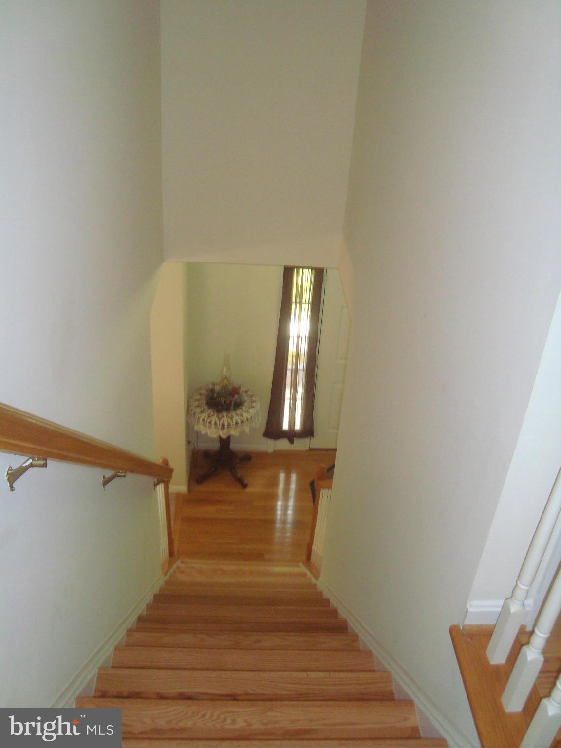 12521 Kent Road King George, VA 22485 - Photo 12 of 30 New hardwood on stairs to second level