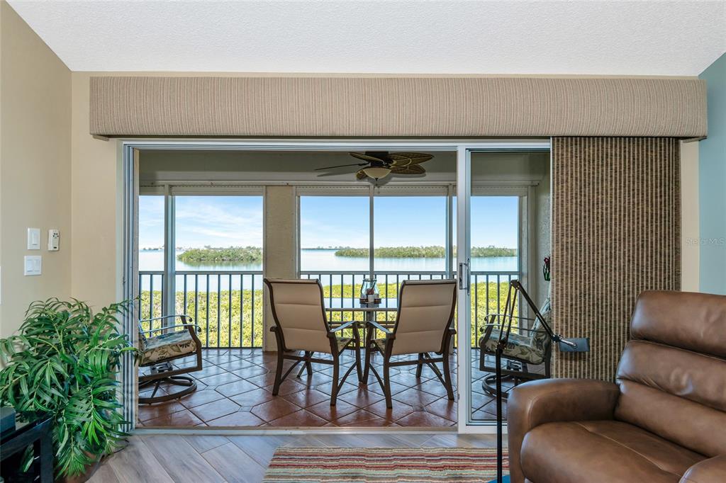 1389 Perico Point Circle, Unit 140 Bradenton, FL 34209 - Photo 26 of 58 an outdoor living area with furniture