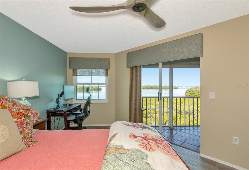 1389 Perico Point Circle, Unit 140 Bradenton, FL 34209 - Photo 31 of 58 a bed room with a bed and a window