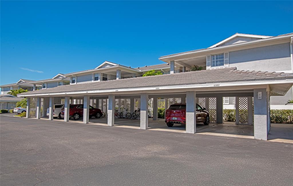 1389 Perico Point Circle, Unit 140 Bradenton, FL 34209 - Photo 10 of 58 a view of a building with a terrace