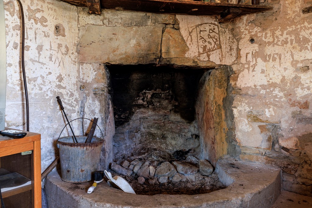 2937 Langes Mill Road Doss, TX 78618 - Photo 25 of 68 a view of a fireplace in a room