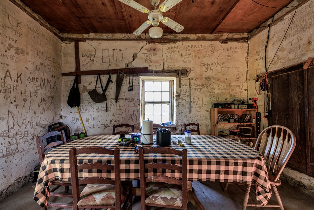 2937 Langes Mill Road Doss, TX 78618 - Photo 26 of 68 a bedroom with furniture a ceiling fan and a rug