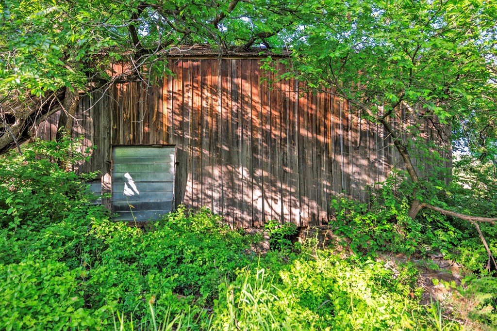 2937 Langes Mill Road Doss, TX 78618 - Photo 7 of 68 a garden view with a seating space