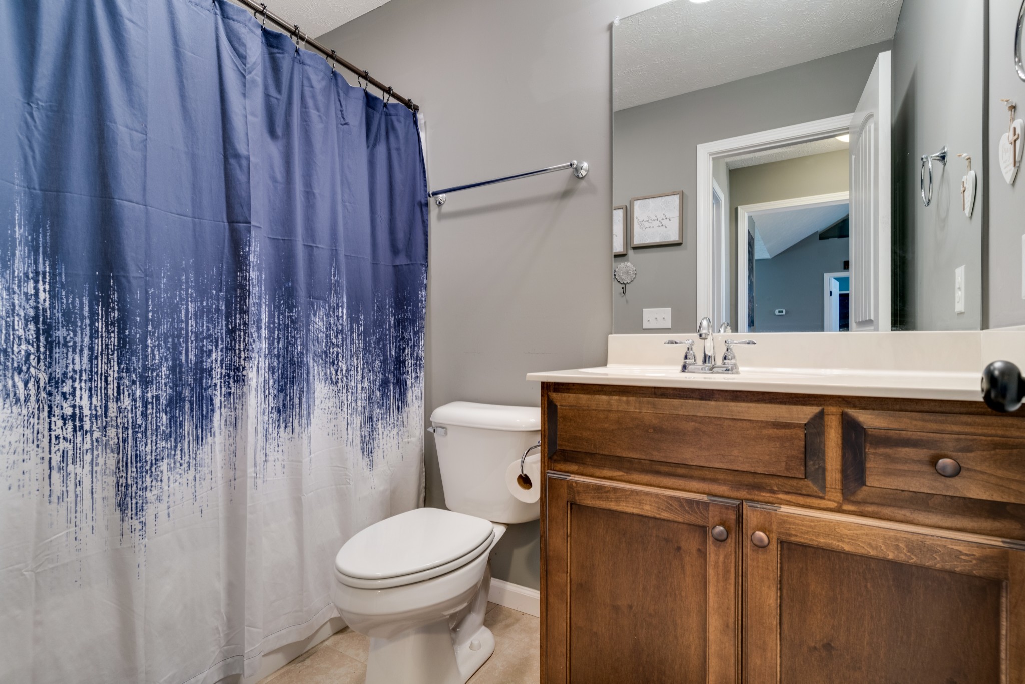 7927 Cedar Grove Road Cross Plains, TN 37049 - Photo 18 of 26 a bathroom with a sink toilet and shower