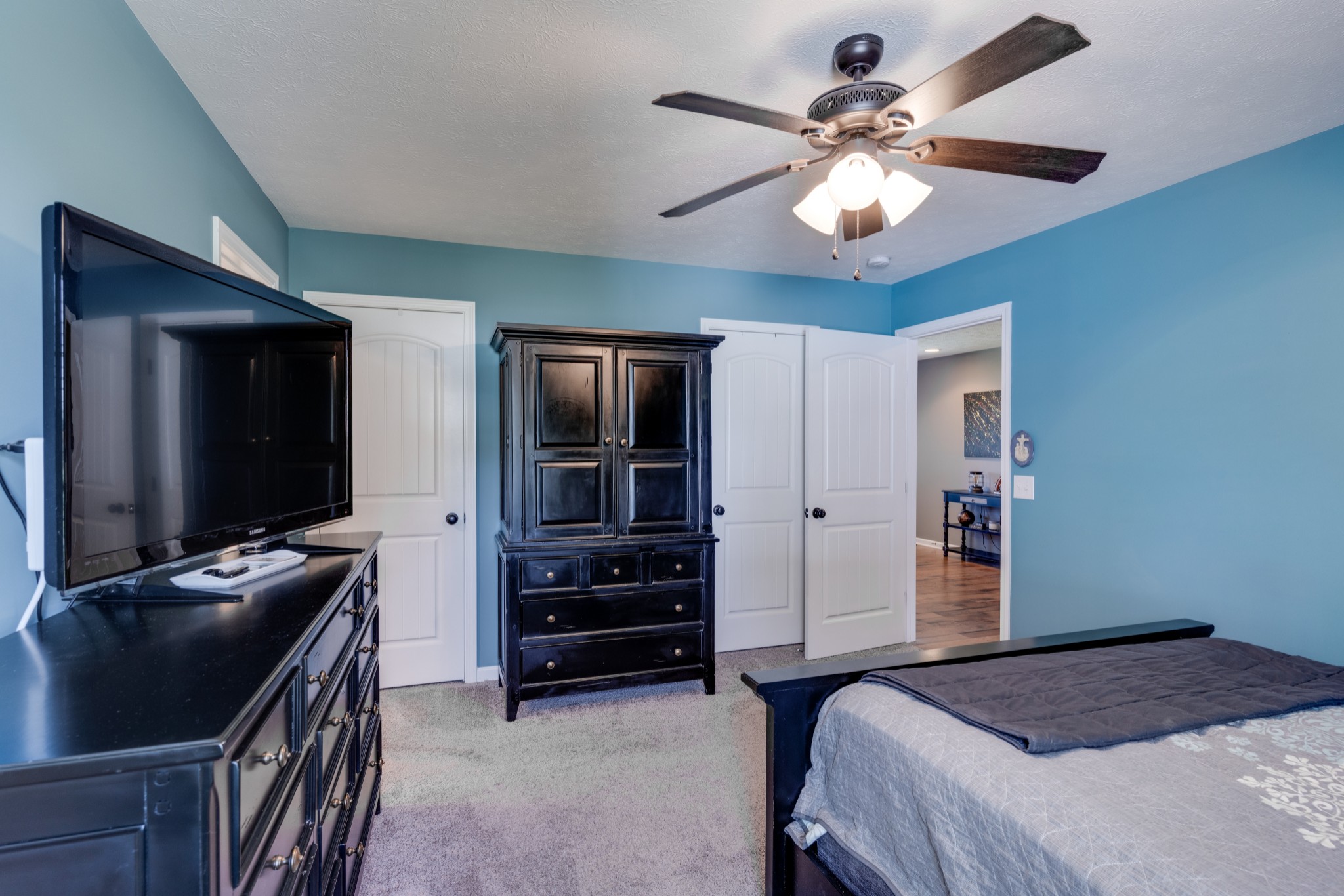 7927 Cedar Grove Road Cross Plains, TN 37049 - Photo 20 of 26 a bedroom with a bed and a flat screen tv
