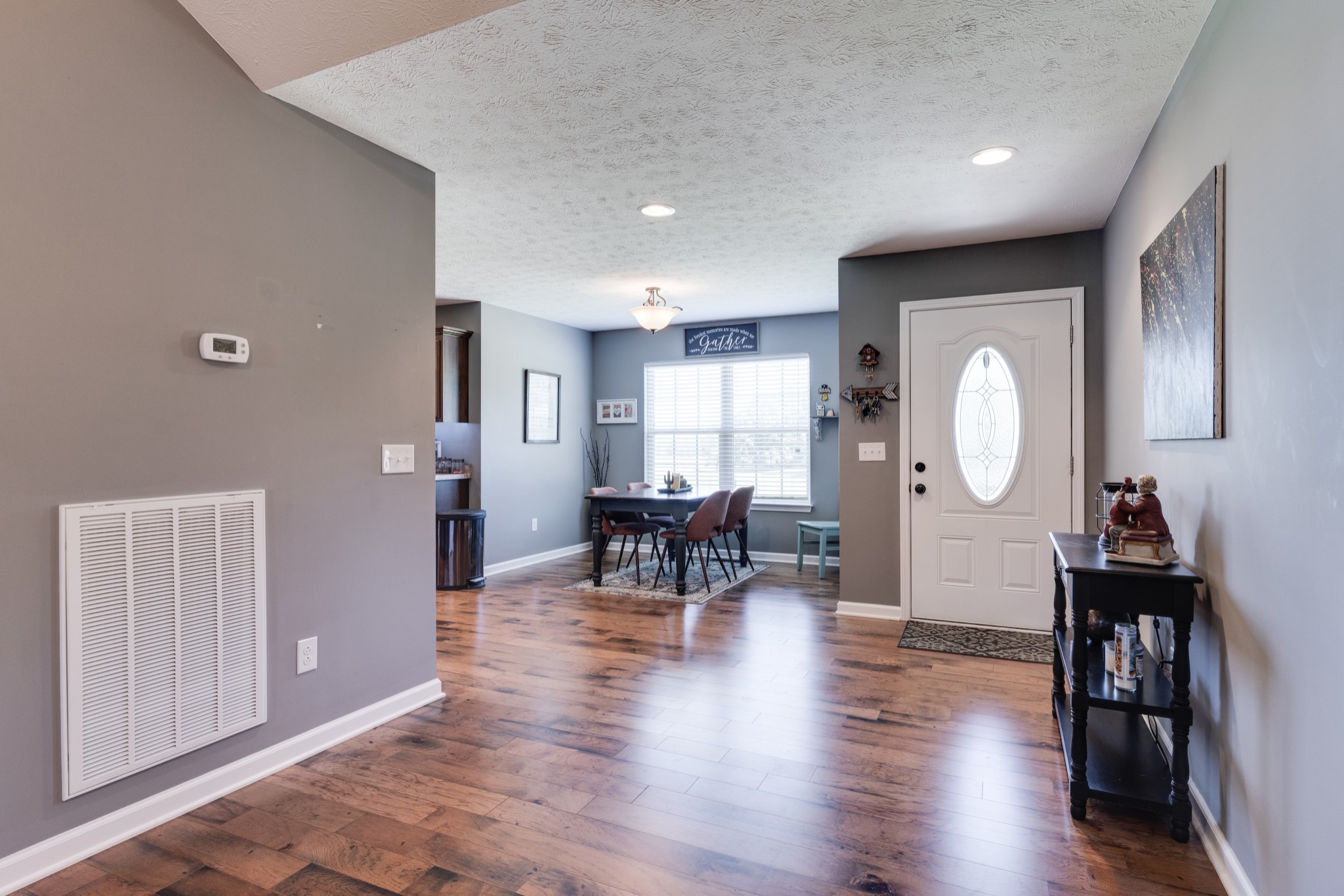 7927 Cedar Grove Road Cross Plains, TN 37049 - Photo 5 of 26 a living room with furniture a dining table and wooden floor