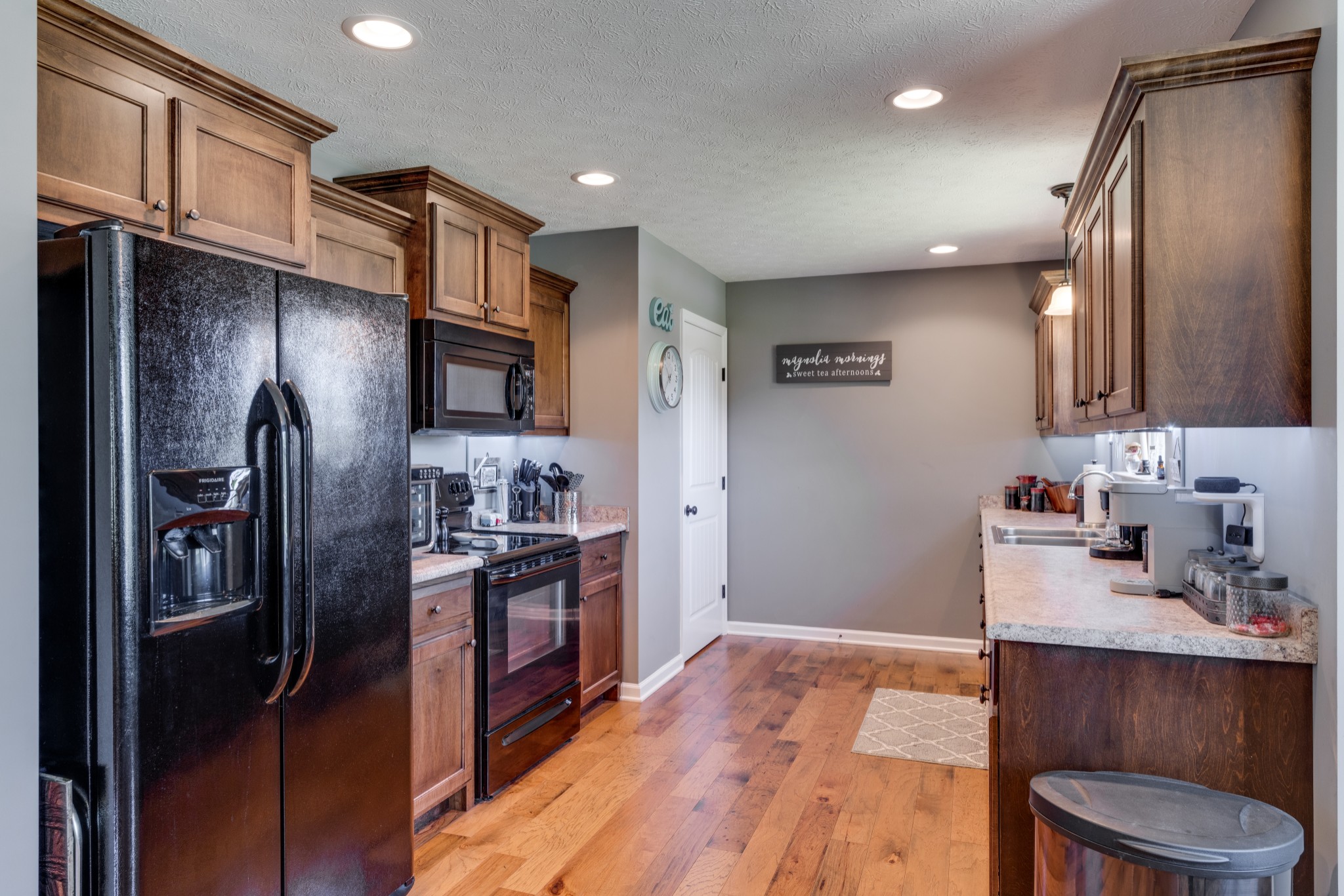 7927 Cedar Grove Road Cross Plains, TN 37049 - Photo 8 of 26 a kitchen with stainless steel appliances a refrigerator stove and sink