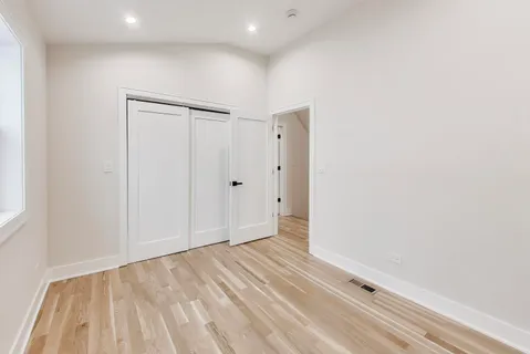 a bathroom with a sink toilet and mirror