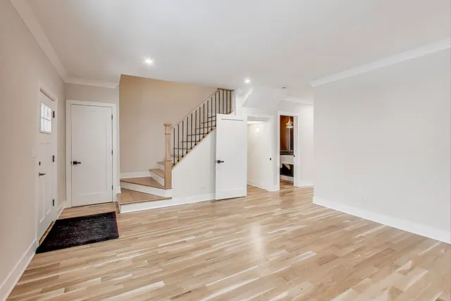 a kitchen with stainless steel appliances granite countertop a stove and a refrigerator