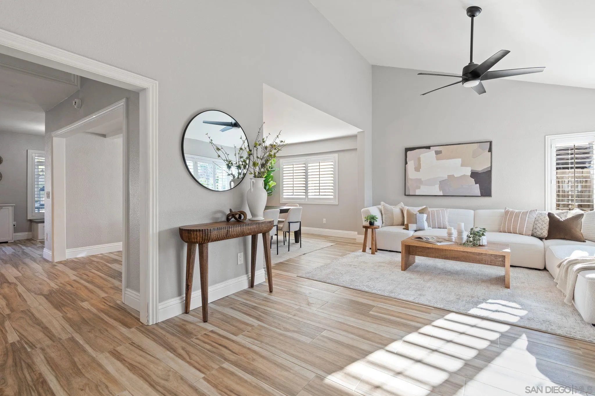 3576 Normandy Circle Oceanside, CA 92056 - Photo 18 of 67 a living room with furniture a rug and a window
