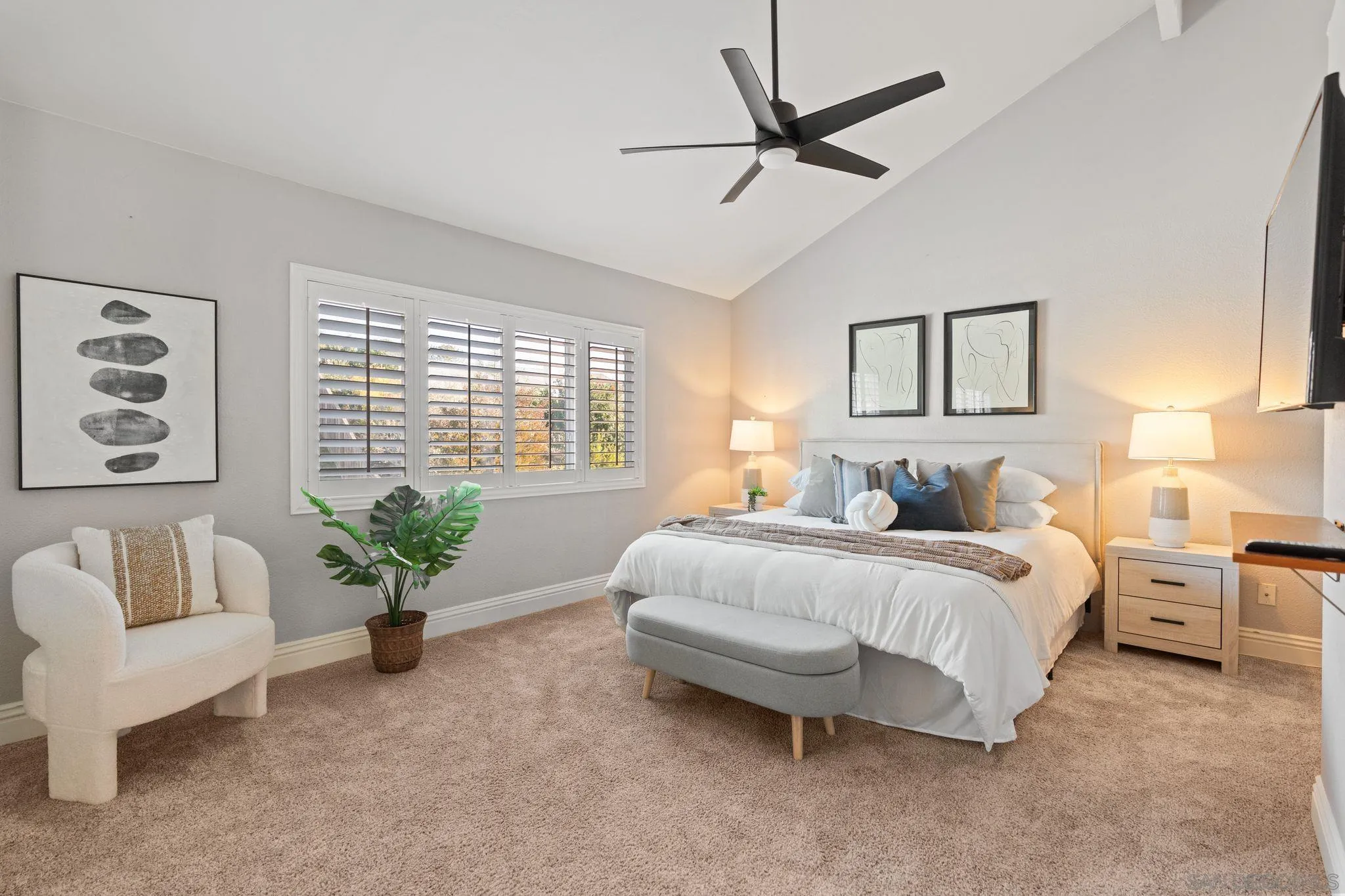 3576 Normandy Circle Oceanside, CA 92056 - Photo 37 of 67 a spacious bedroom that has a bed and a couch