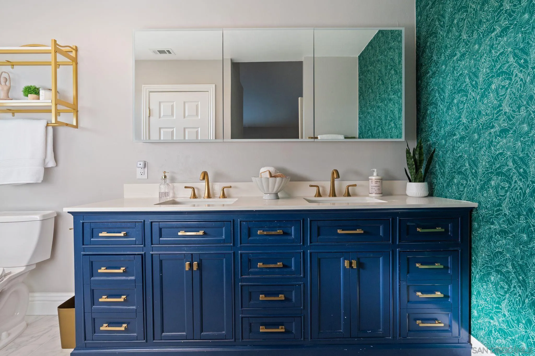 3576 Normandy Circle Oceanside, CA 92056 - Photo 40 of 67 a bathroom with a sink and a mirror