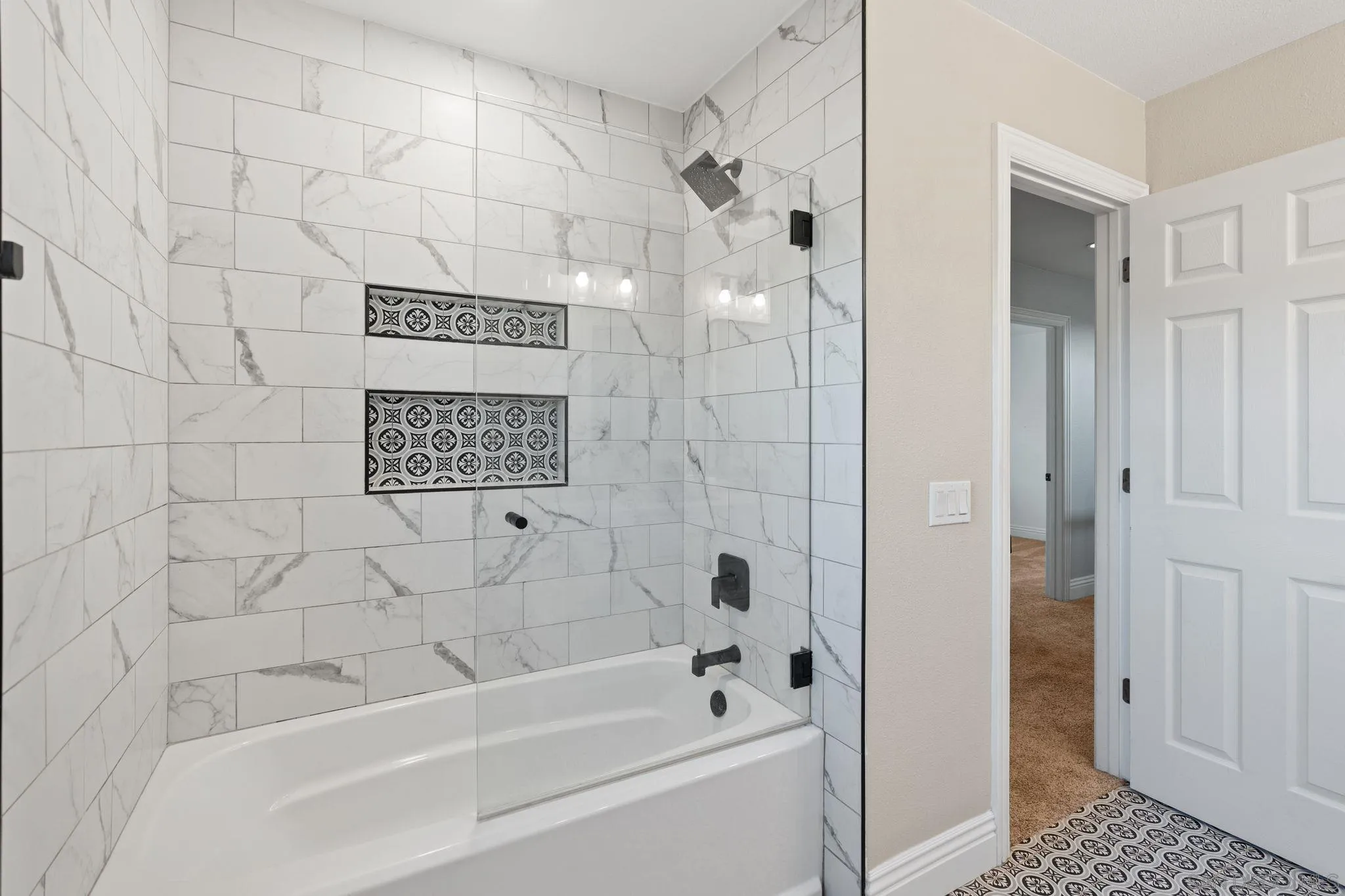 3576 Normandy Circle Oceanside, CA 92056 - Photo 47 of 67 a bathroom with a shower and a bath tub