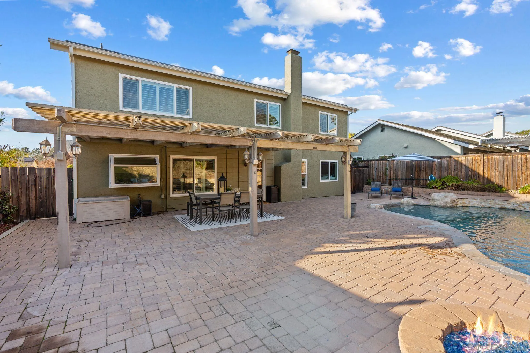 3576 Normandy Circle Oceanside, CA 92056 - Photo 51 of 67 a view of a house with backyard porch and sitting area