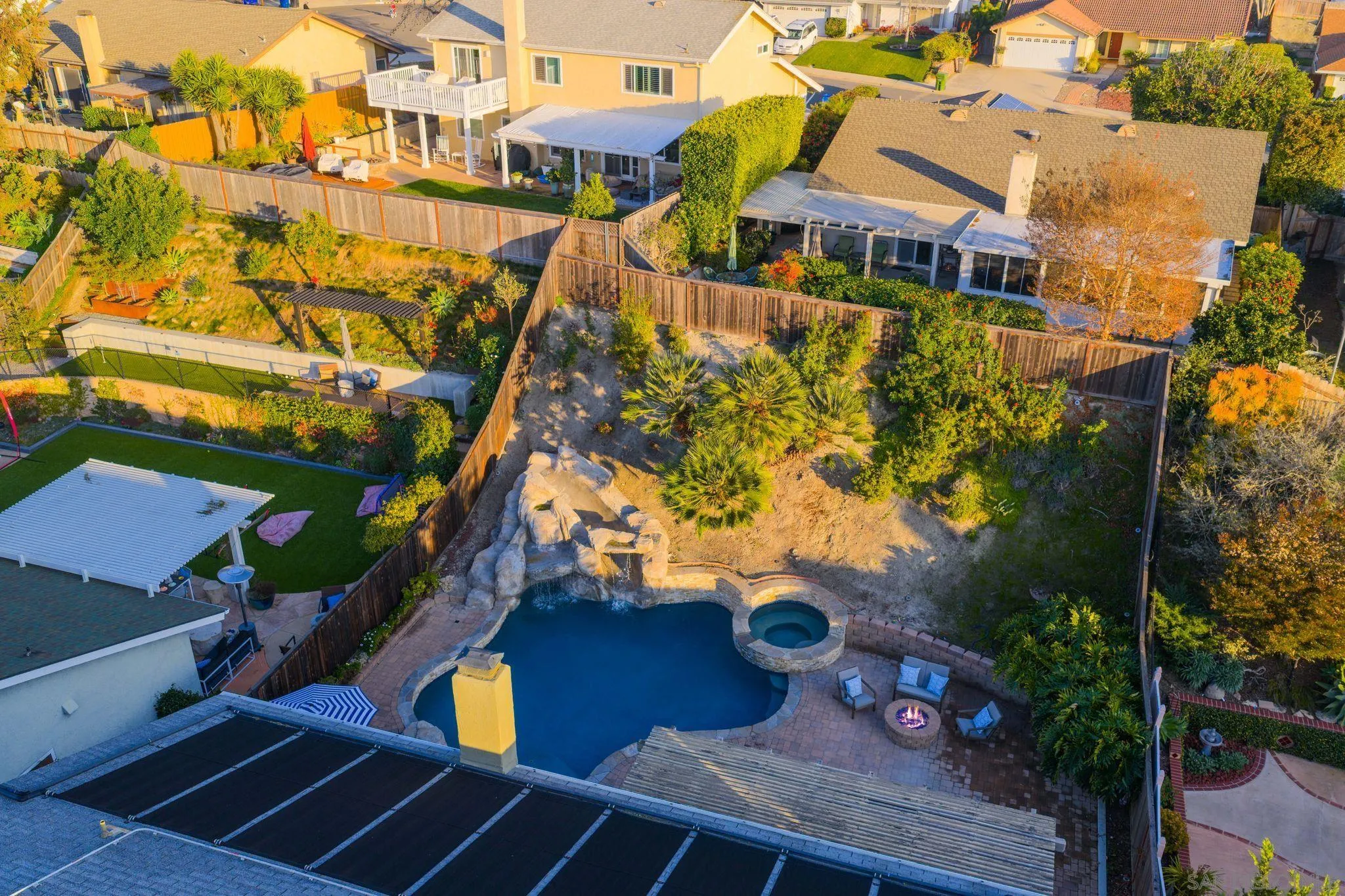3576 Normandy Circle Oceanside, CA 92056 - Photo 62 of 67 an aerial view of a house with a yard