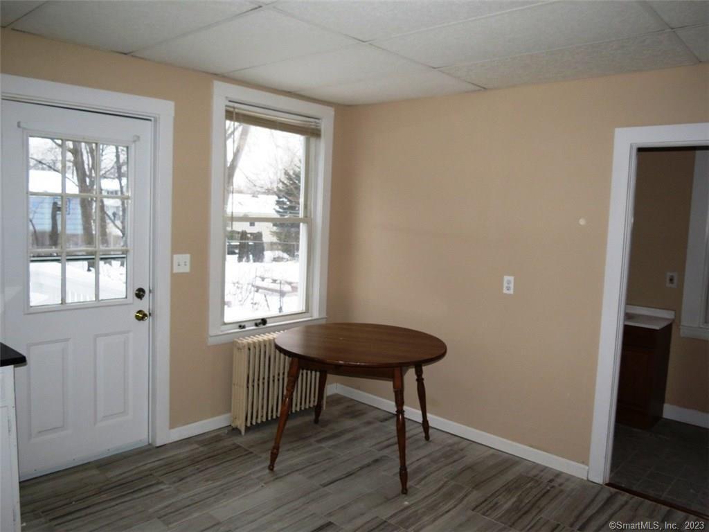 13 Wilcox Street Wethersfield, CT 06109 - Photo 18 of 21 a view of a room with a table and chair