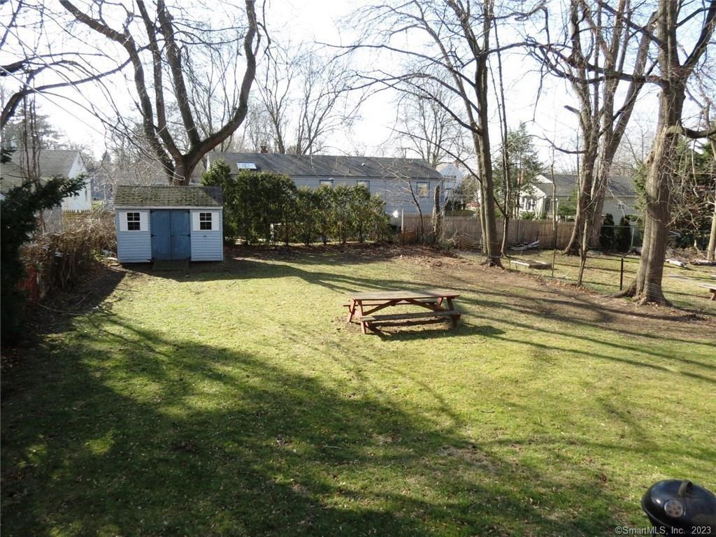 13 Wilcox Street Wethersfield, CT 06109 - Photo 4 of 21 a view of a house with swimming pool and sitting area