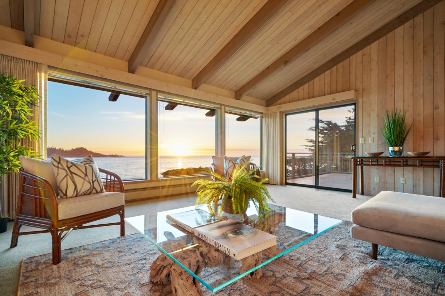 2625 Ribera Road Carmel, CA 93923 - Photo 1 of 1 a living room with furniture and a large window