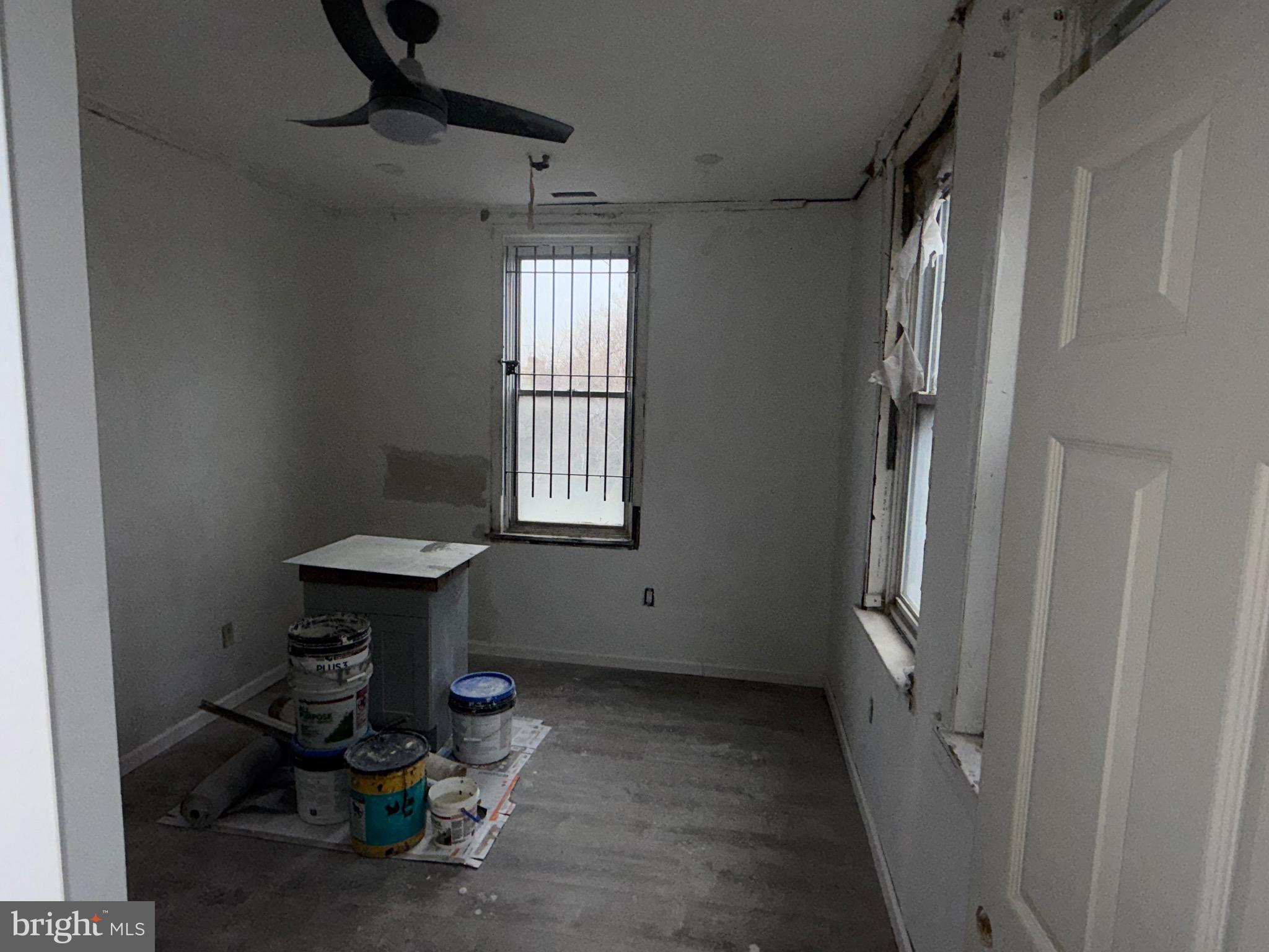 5609 Wyalusing Avenue Philadelphia, PA 19131 - Photo 15 of 36 a view of room with air conditioner duct and materials on floor