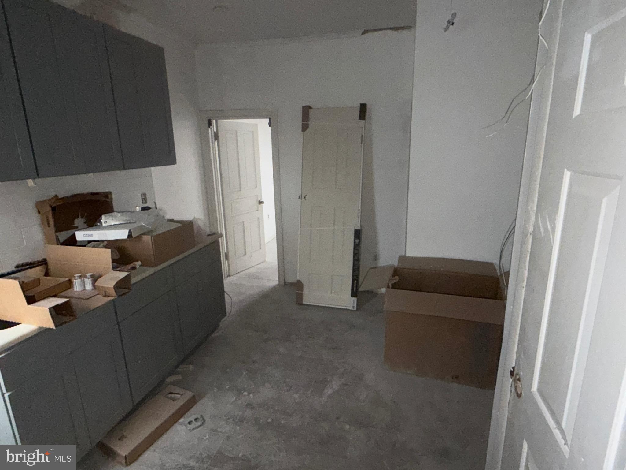 5609 Wyalusing Avenue Philadelphia, PA 19131 - Photo 27 of 36 a living room with furniture and a flat screen tv