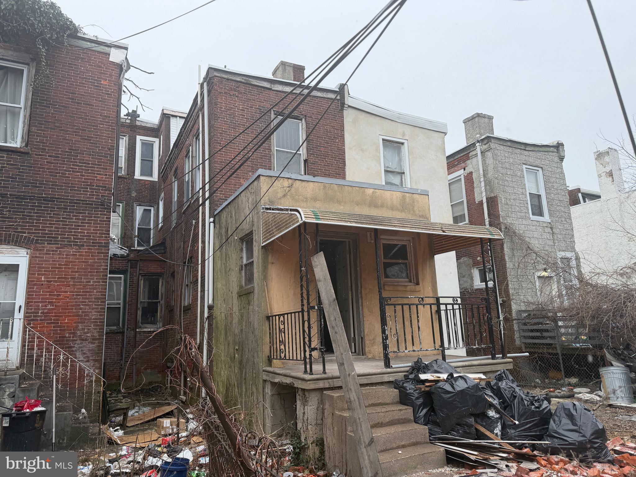 5609 Wyalusing Avenue Philadelphia, PA 19131 - Photo 3 of 36 a view of a house with a small yard