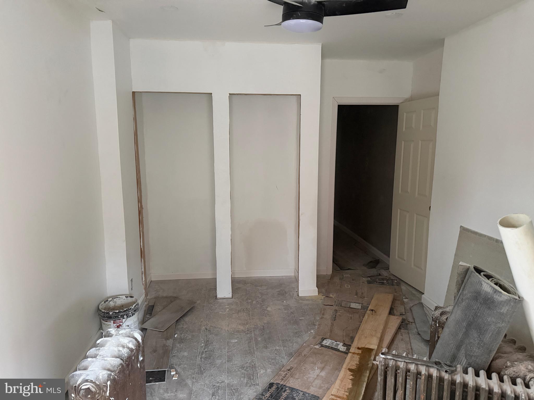 5609 Wyalusing Avenue Philadelphia, PA 19131 - Photo 5 of 36 a room with a couch and a stove