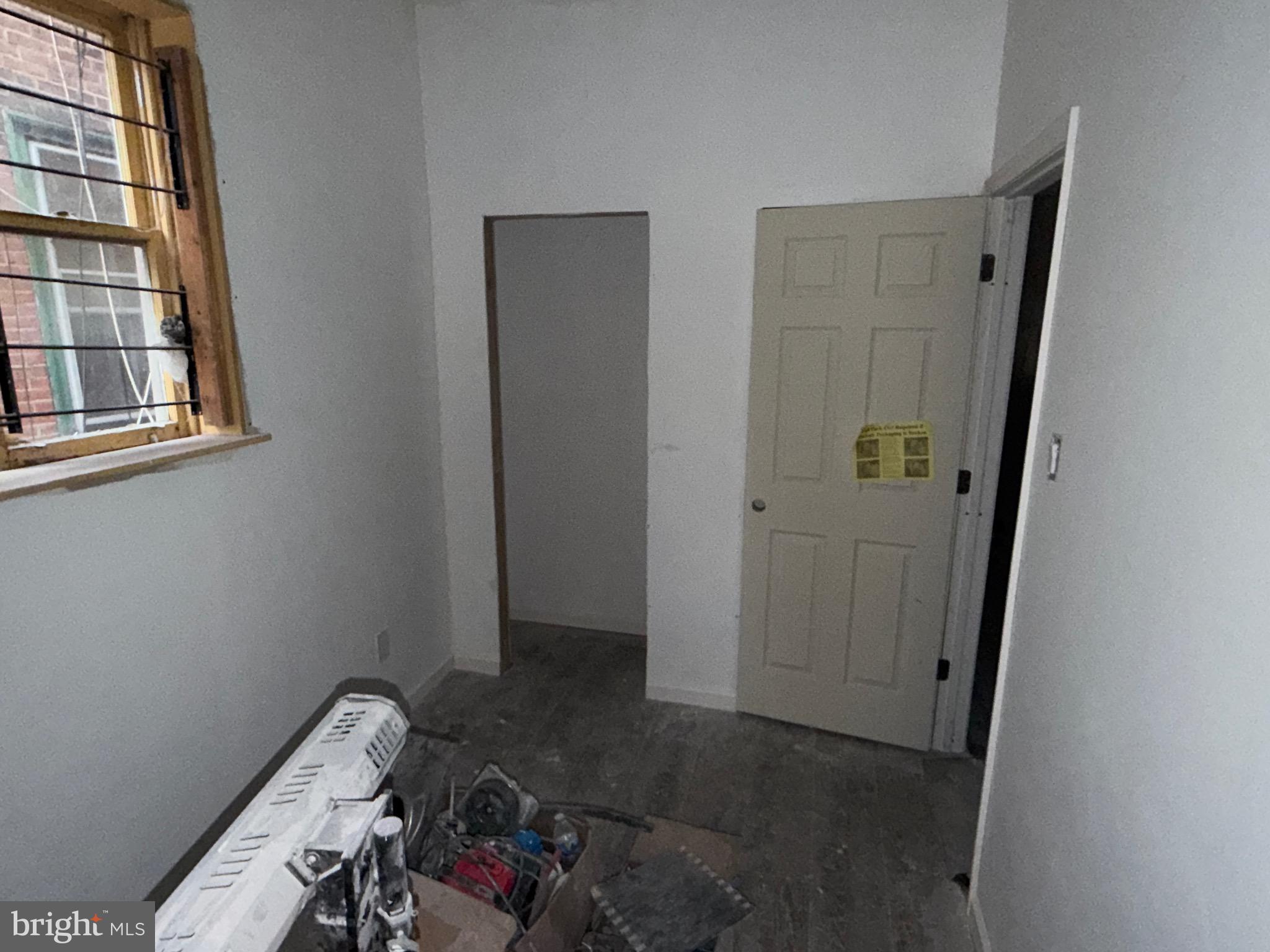 5609 Wyalusing Avenue Philadelphia, PA 19131 - Photo 7 of 36 a view of room with window and hardwood