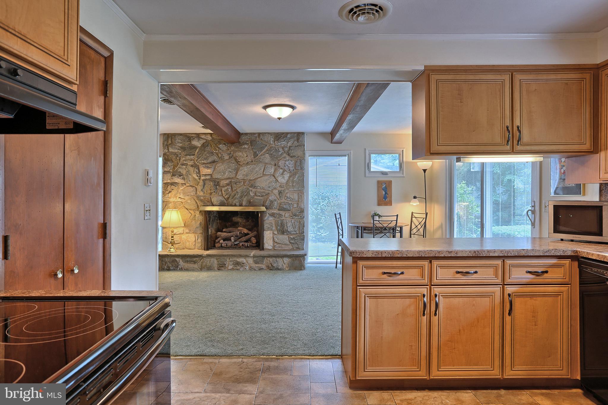2 Pennwood Road Lebanon, PA 17042 - Photo 12 of 44 Kitchen overlooks family room and cozy fireplace